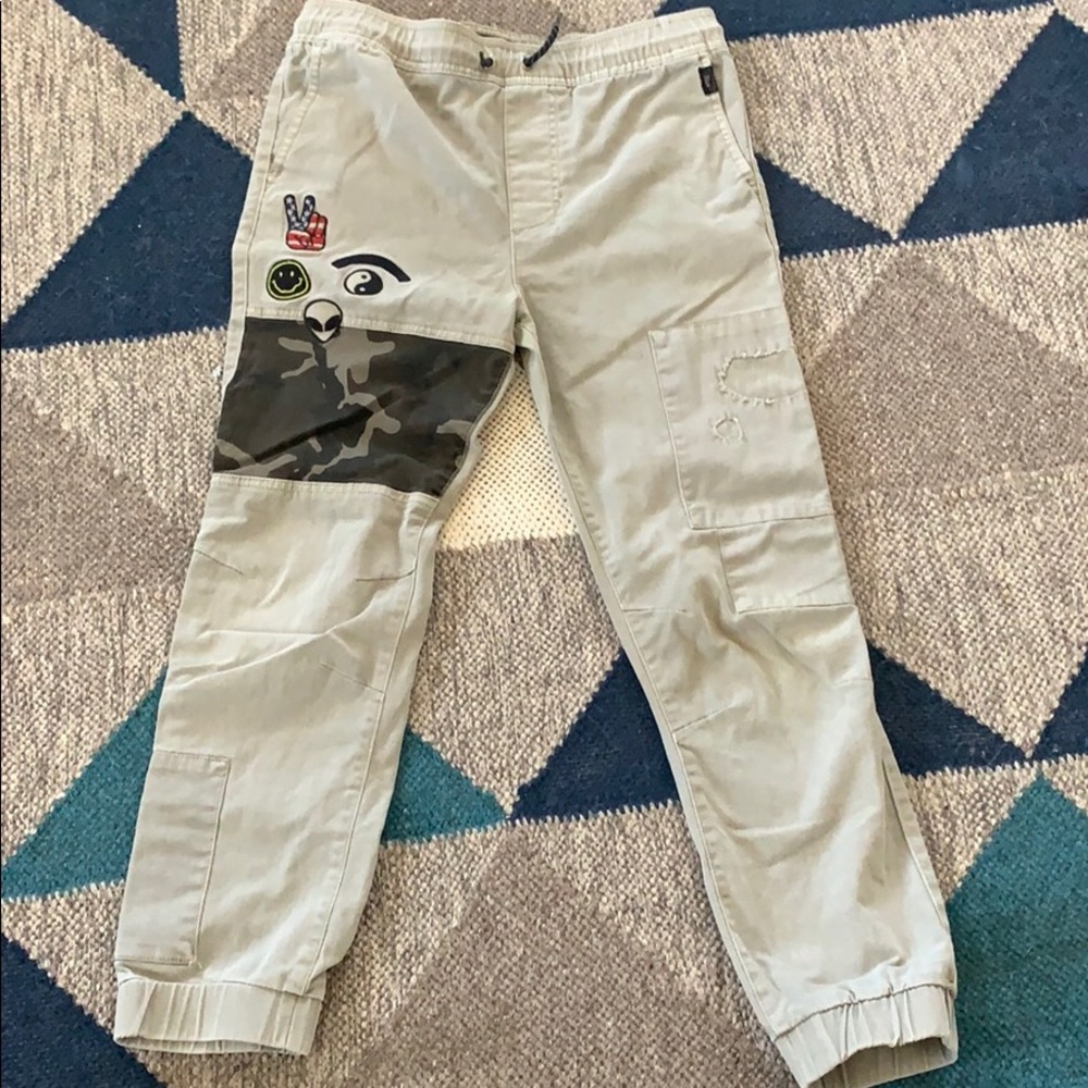 Cream with camo joggers.